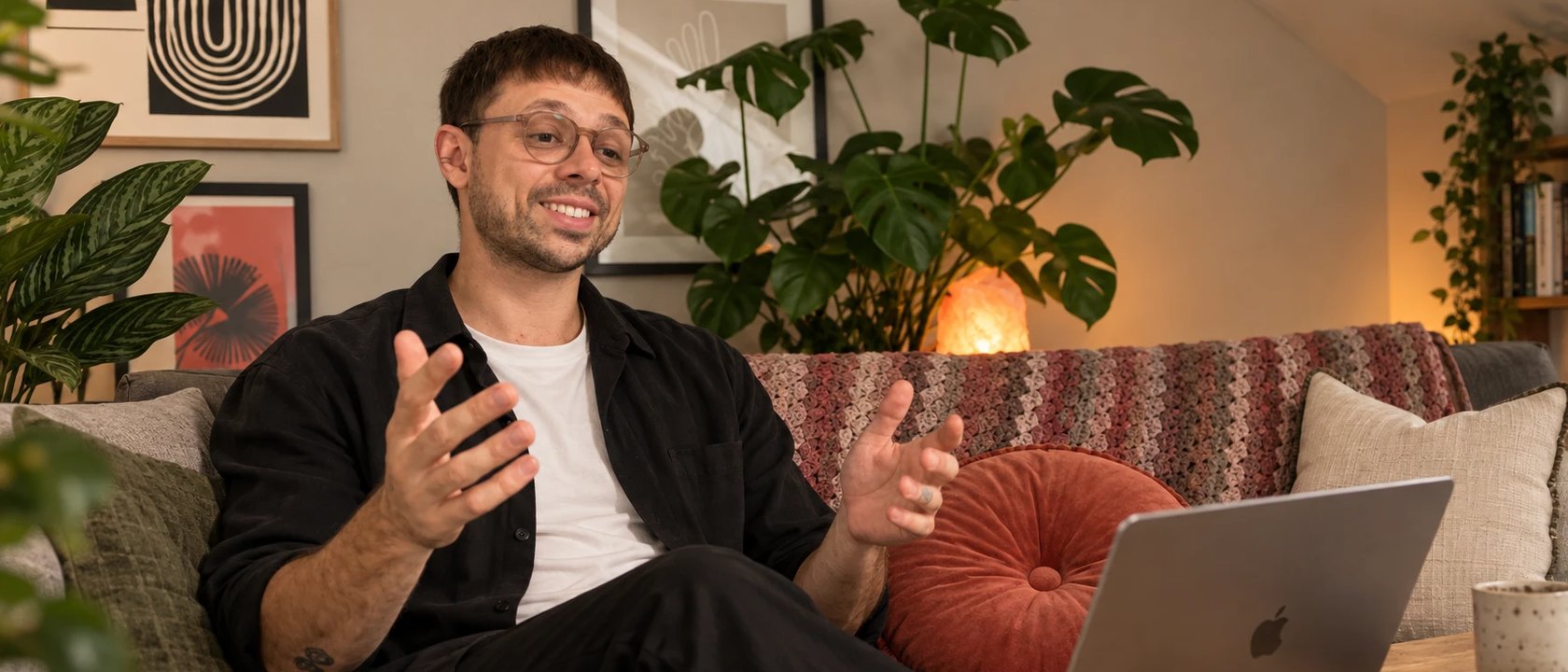 Iden talking with a client over a video call